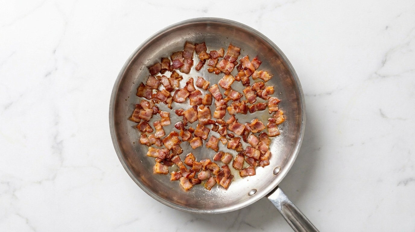 Step 2: Fry the lardons crisp in a frying pan.