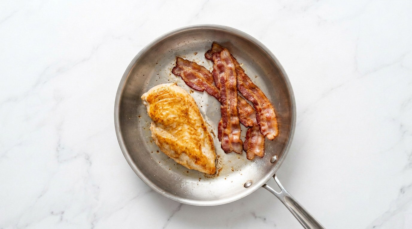 Step 1: Fry the chicken through and golden, fry the bacon crisp and slice the chicken.